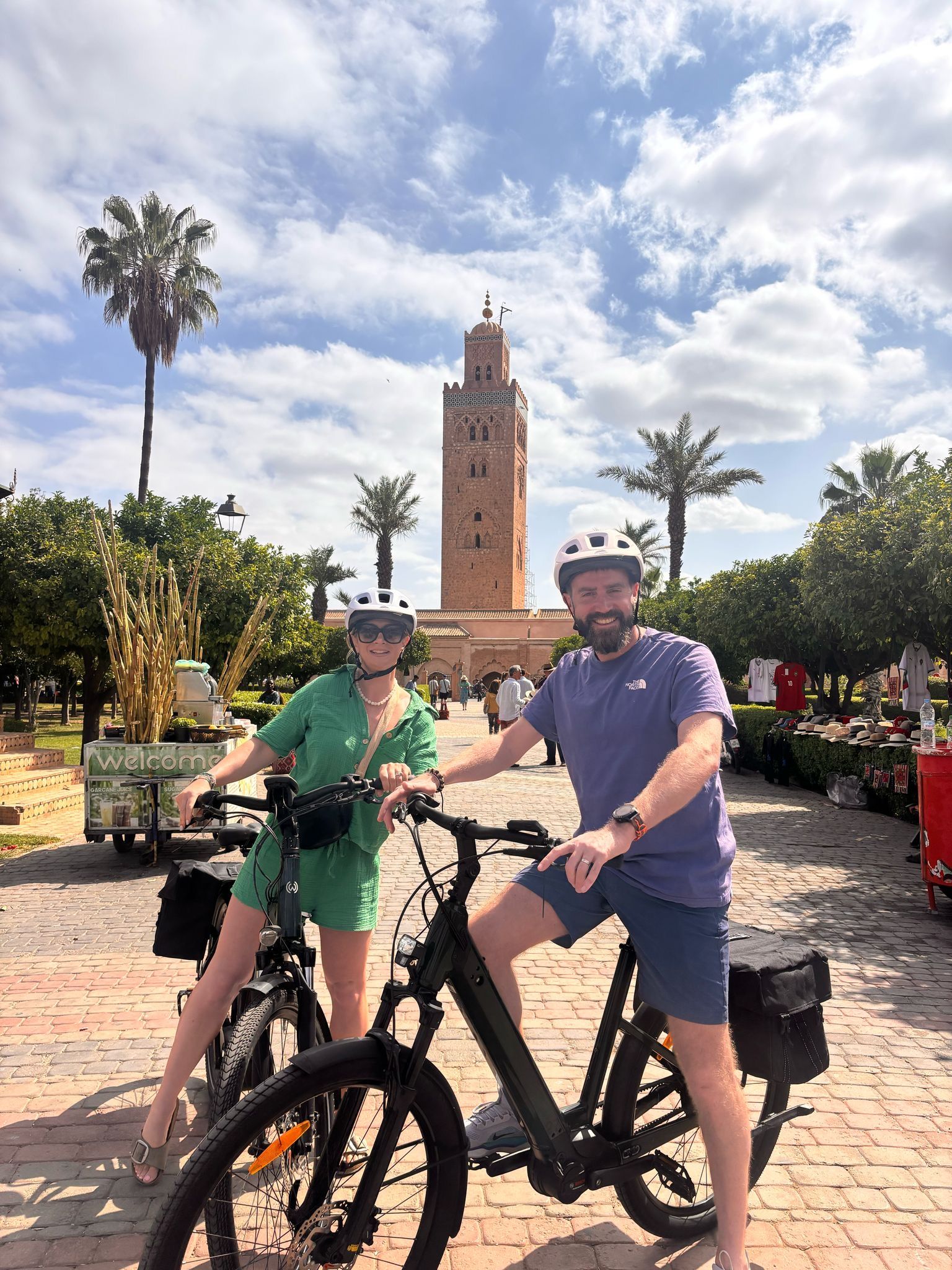 Happy couple on e-bike tour at Koutoubia